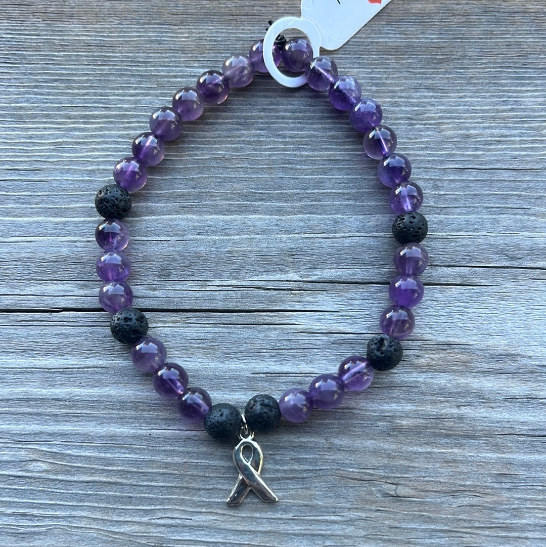 Amethyst and Lava Stone Crystal Bracelet- 7.5”. Cancer