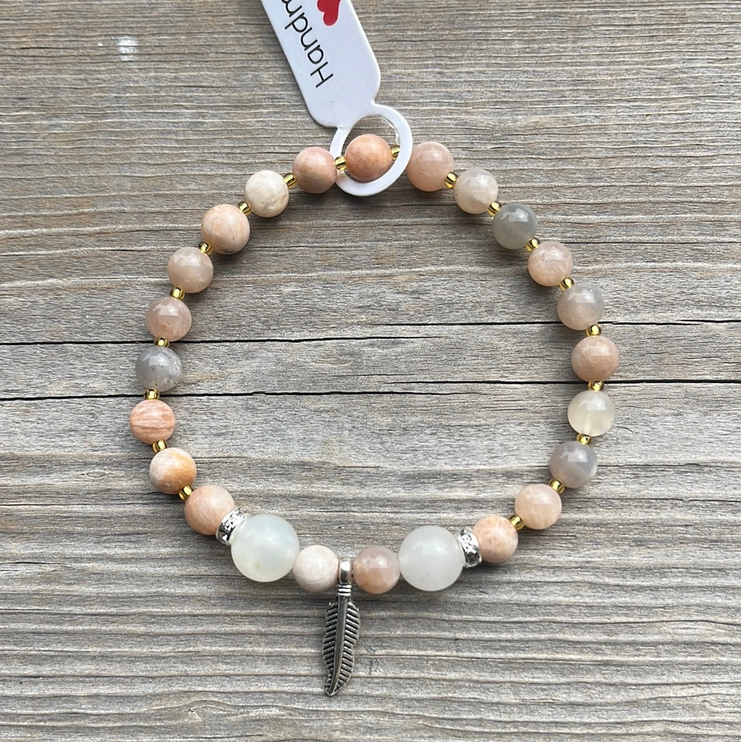 Sunstone crystal bracelet - 7”. Feather
