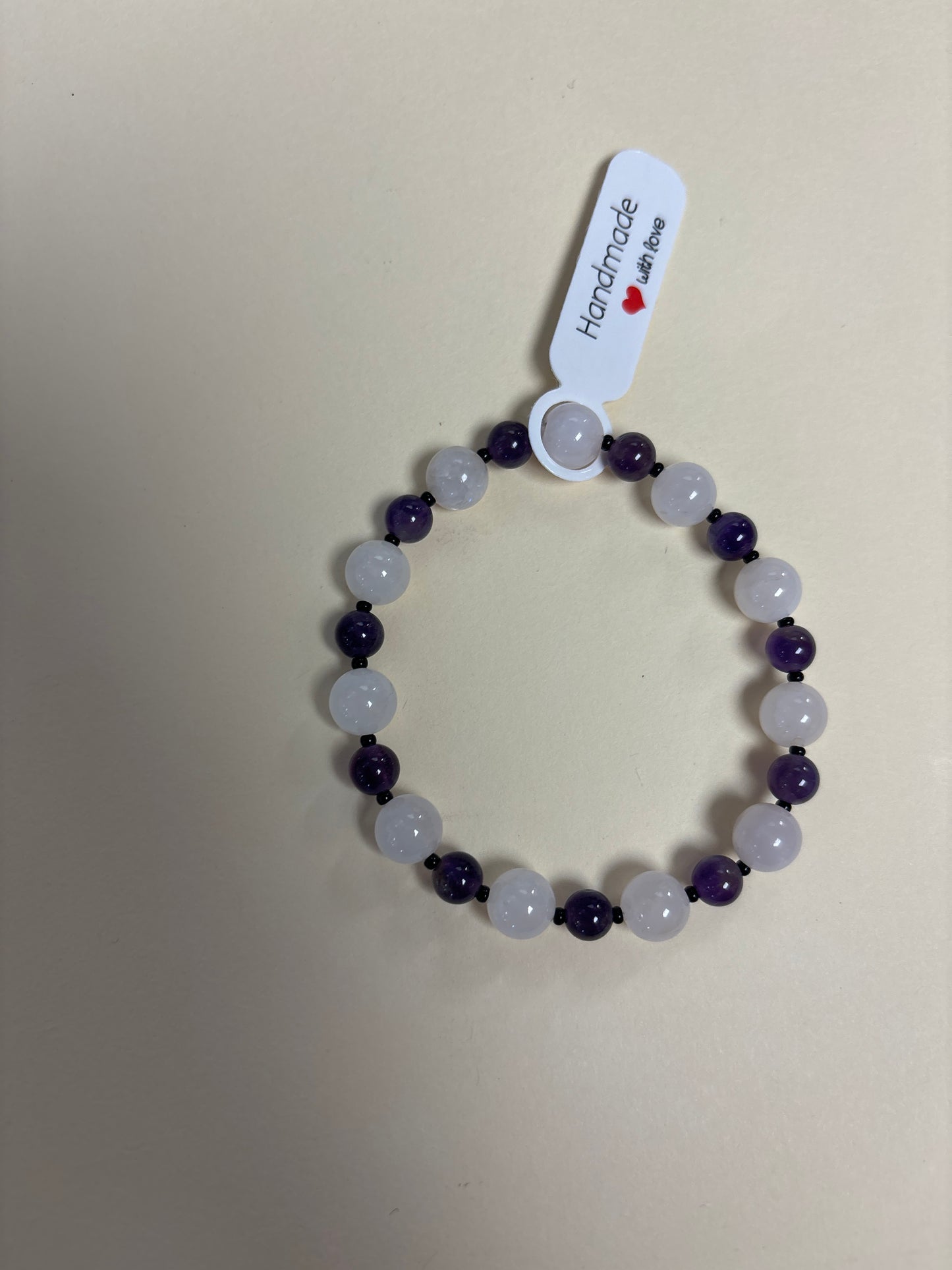 Amethyst and rose quartz crystal bracelet - 7”