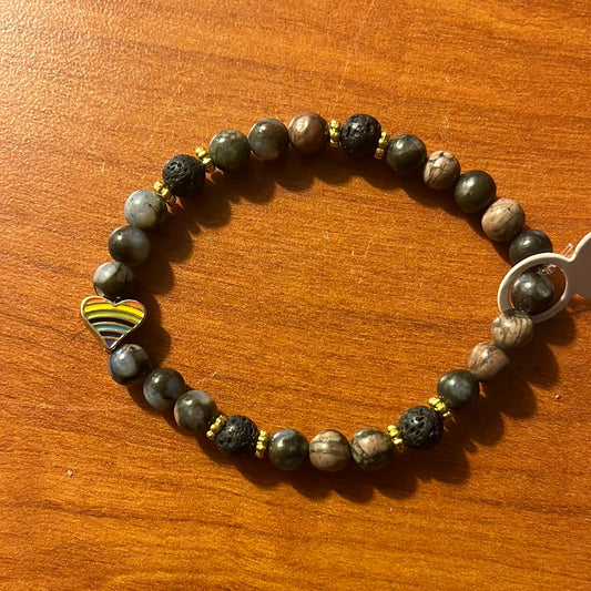 Glaucophane and lava stone crystal bracelet -7”. Pride heart