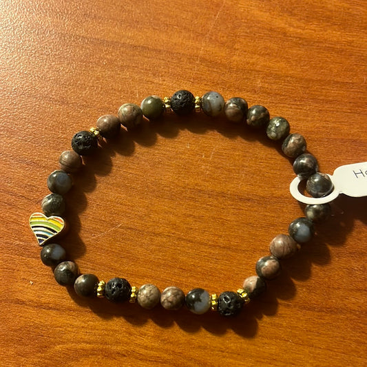 Glaucophane and lava stone crystal bracelet -7.5” pride heart