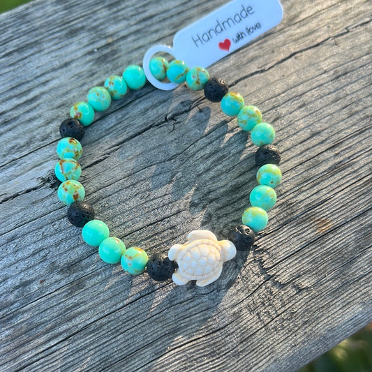 Turquoise and Lava Stone Crystal Bracelet- 7”.