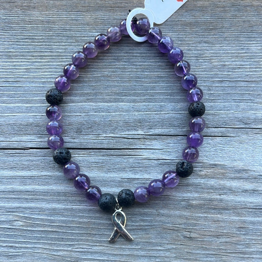 Amethyst and Lava Stone Crystal Bracelet- 7.5”. Cancer