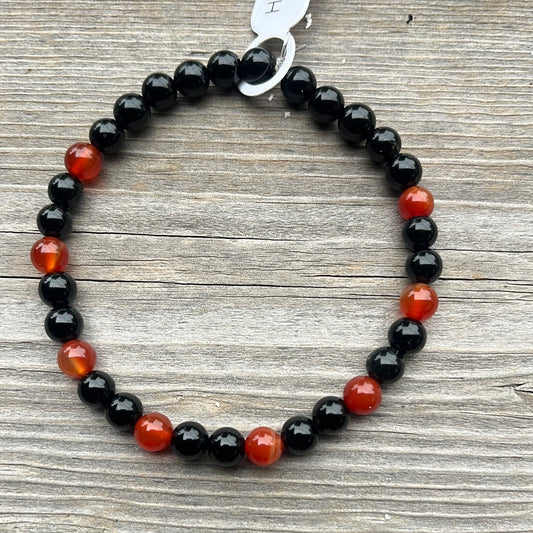 Red and black agate and lava stone crystal bracelet - 7.5”.