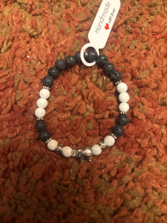 Howlit & Lava Stone with Elephant - 6.5”