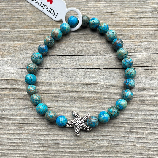 Chrysocolia crystal bracelet made to made to 7”. Silver starfish