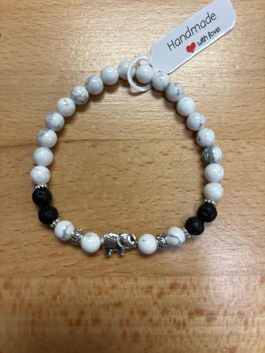 Howlite and lava stone crystal bracelet- 7.5” silver elephant