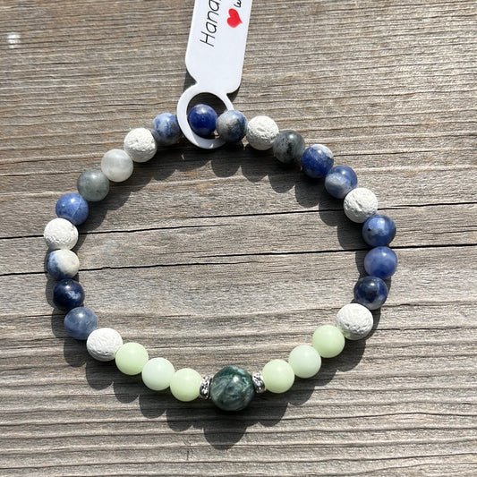 Jasper, glow in dark glass, lava stone and sodalite crystal bracelet - 7”